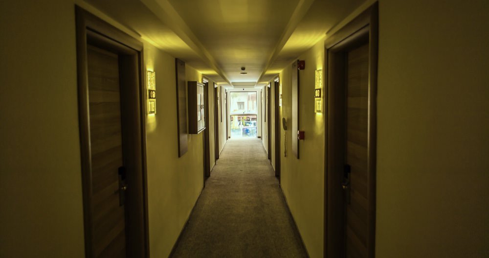 hotel-complicit-sex-trafficking-exploitation-doors-hallway